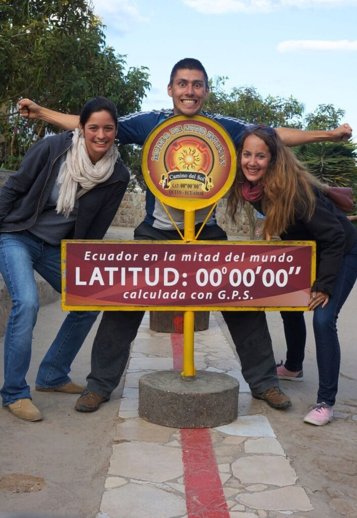 In the middle of the world at the Mitad del Mundo monument in Quito, Ecuador, experiencing the Equator and learning about its scientific significance for Quito tourism