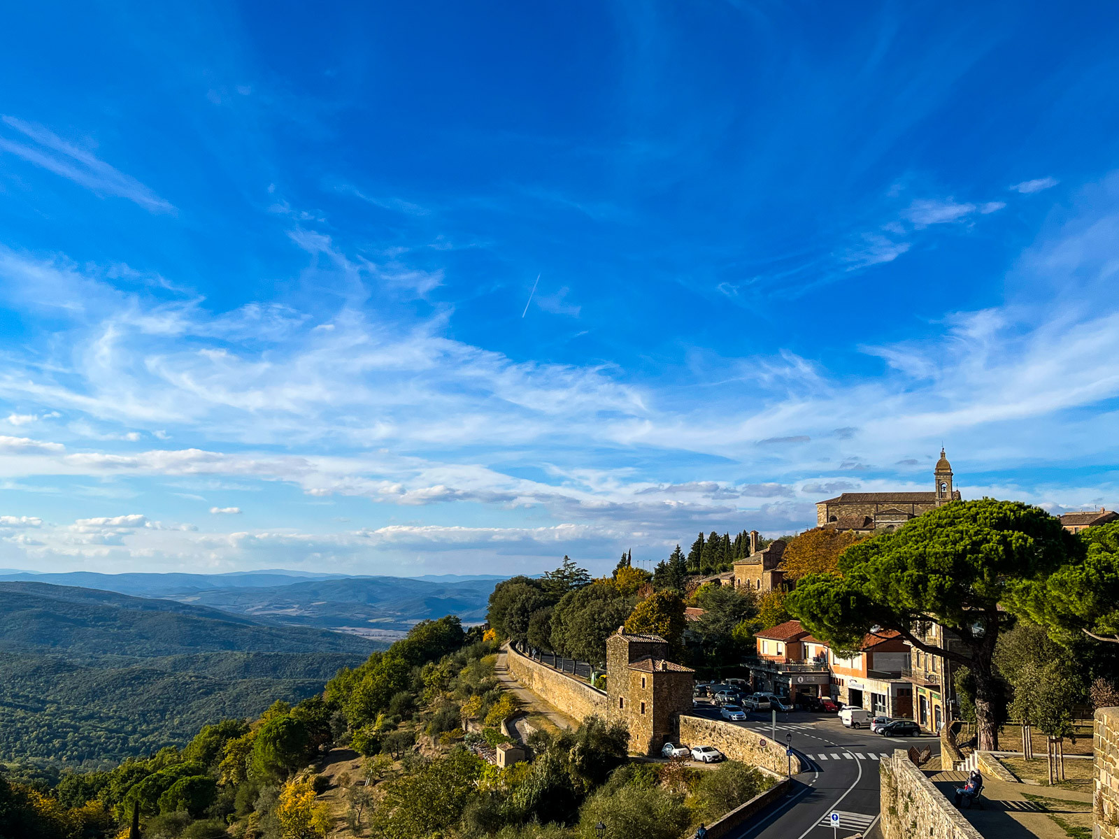 Panoramic view of Montalcino, Italy, showcasing its hilltop location and surrounding vineyards