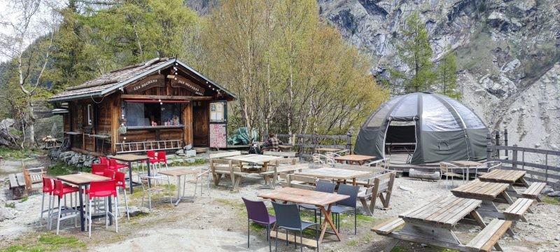 The Mottets bar, an example of local adaptation, offering unique lodging experiences amidst the mountains.