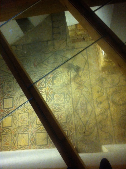 Excavated foundations visible through glass panels on the floor of the Cordoba Mosque