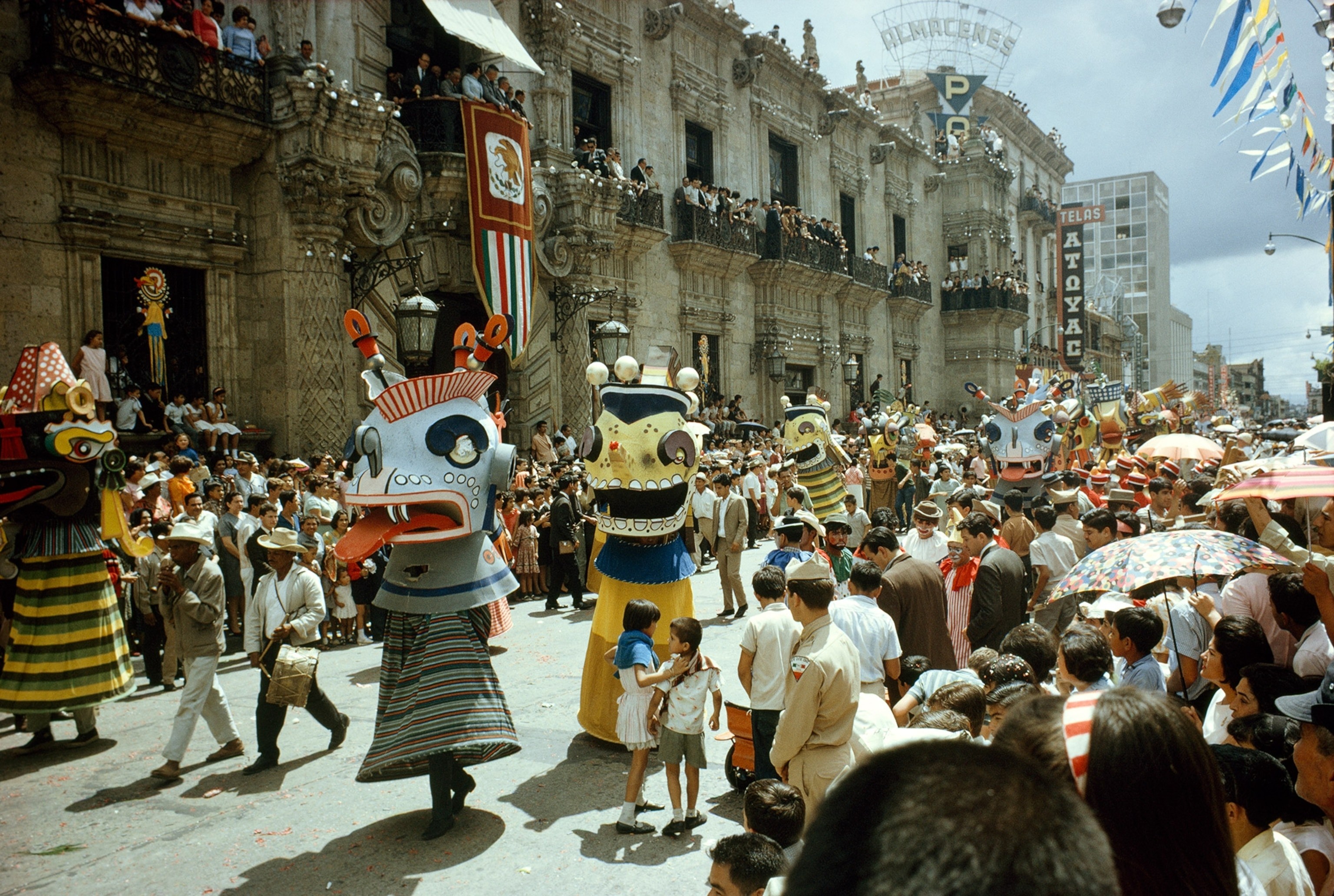 Traditional costumed musicians and dancers at a fall festival in Guadalajara, Mexico
