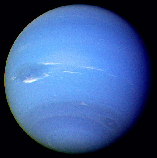 A composite image of Neptune showing its distinct blue color and cloud bands.