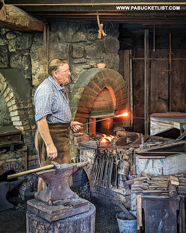 Blacksmithing demonstration at Old Bedford Village