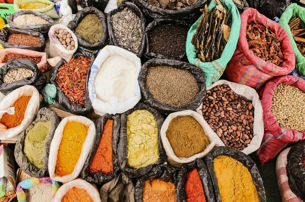 Spices at the Otavalo market, Ecuador, offering a sensory experience and highlighting the local culture and commerce for Quito tourism