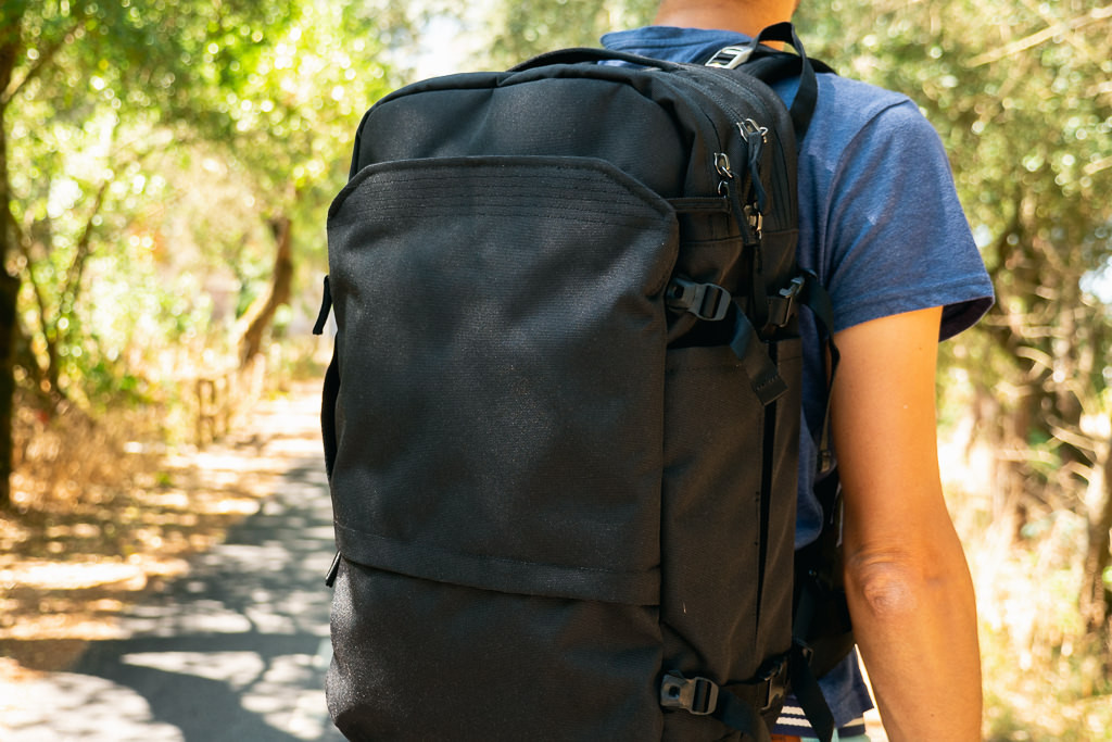 men wearing Pakt Travel Backpack 