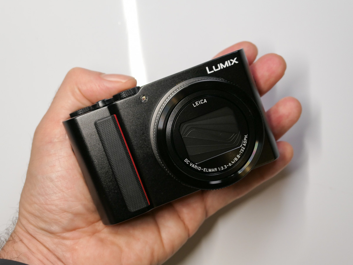 Panasonic Lumix DC-ZS200 camera in hand