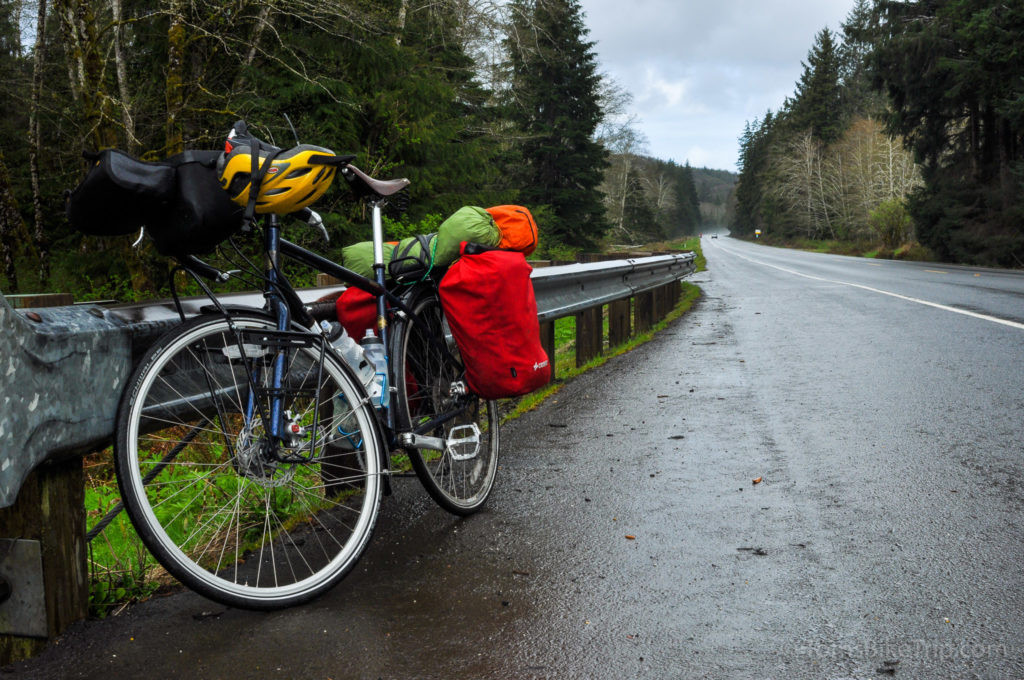 A Kona Sutra 2012 touring bike with luggage on the roadside in the USA.
