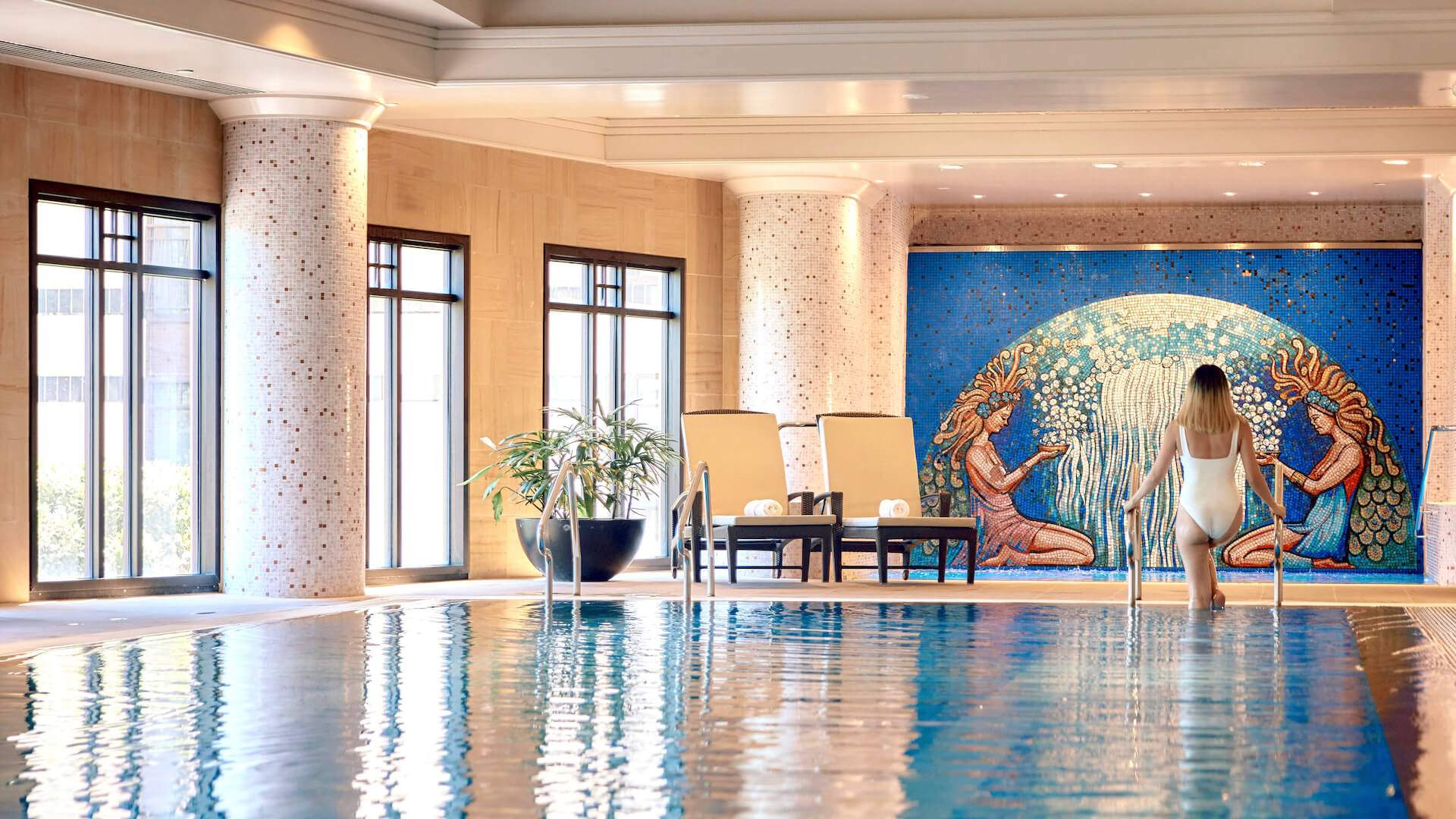 A relaxing pool scene at the Park Hyatt Hotel in Melbourne, showcasing one of the best spa experiences in the city