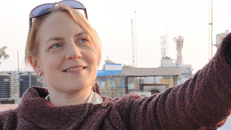 Image of Penny taking a selfie while travelling, highlighting the solo travel experience