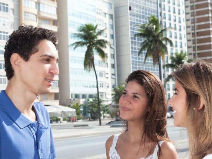 People greeting each other in a Spanish speaking country