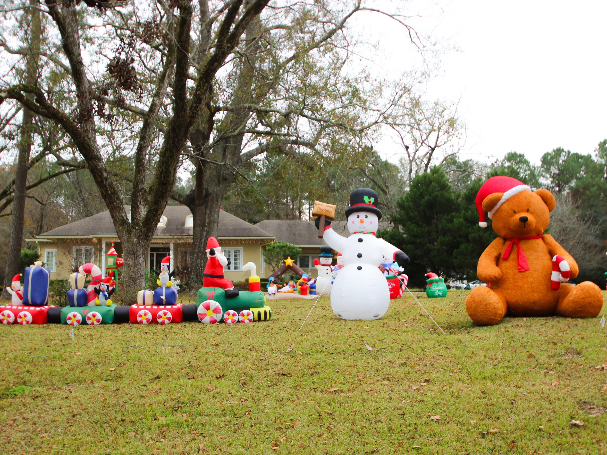 A (CASE) FULL OF CHRISTMAS INFLATABLES, showcasing an impressive array of festive inflatables