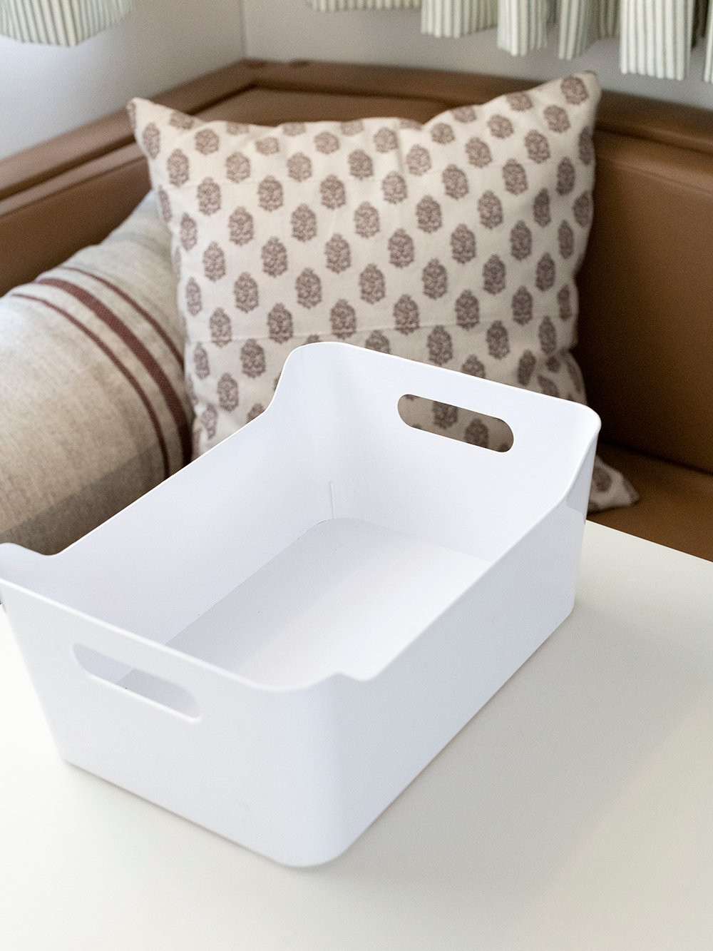 Under-bed storage with plastic bins