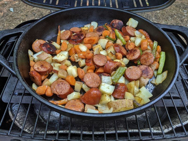 Our previous grill with our cast-iron skillet.