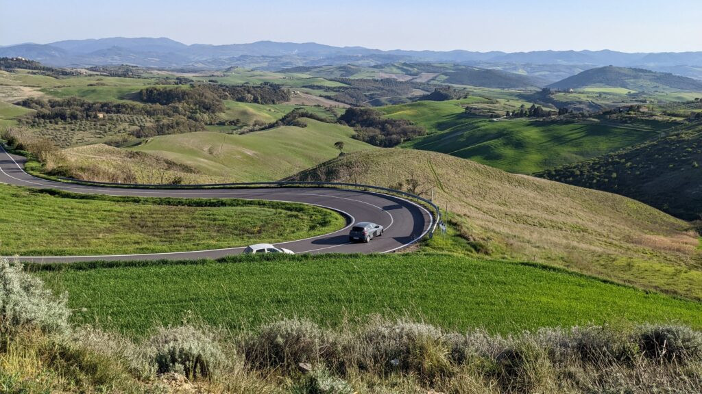 Renault Clio parked on a picturesque road in Italy