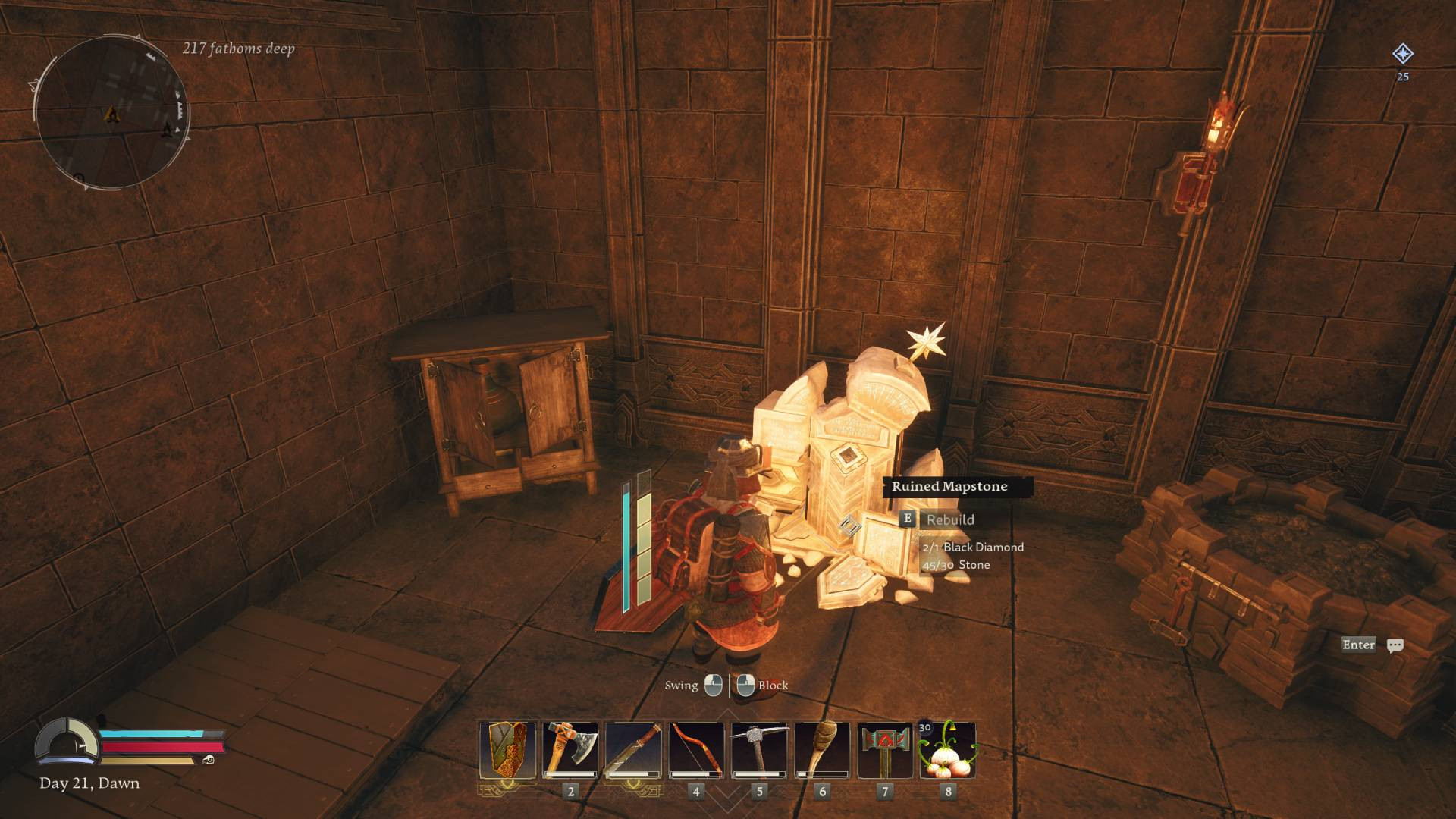 A mapstone is illuminated in Return to Moria.