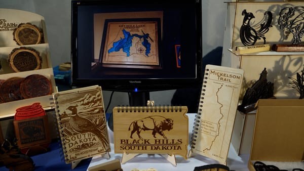 Jason Reuter promoted his woodworking business at the annual governor