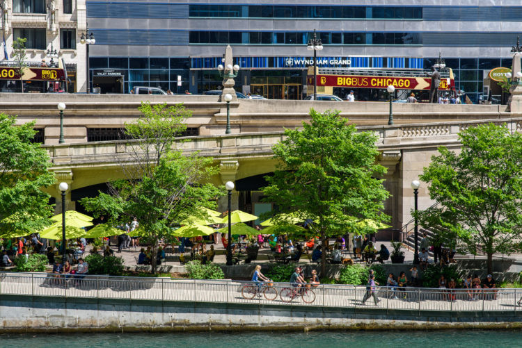 People relaxing on the Chicago Riverwalk