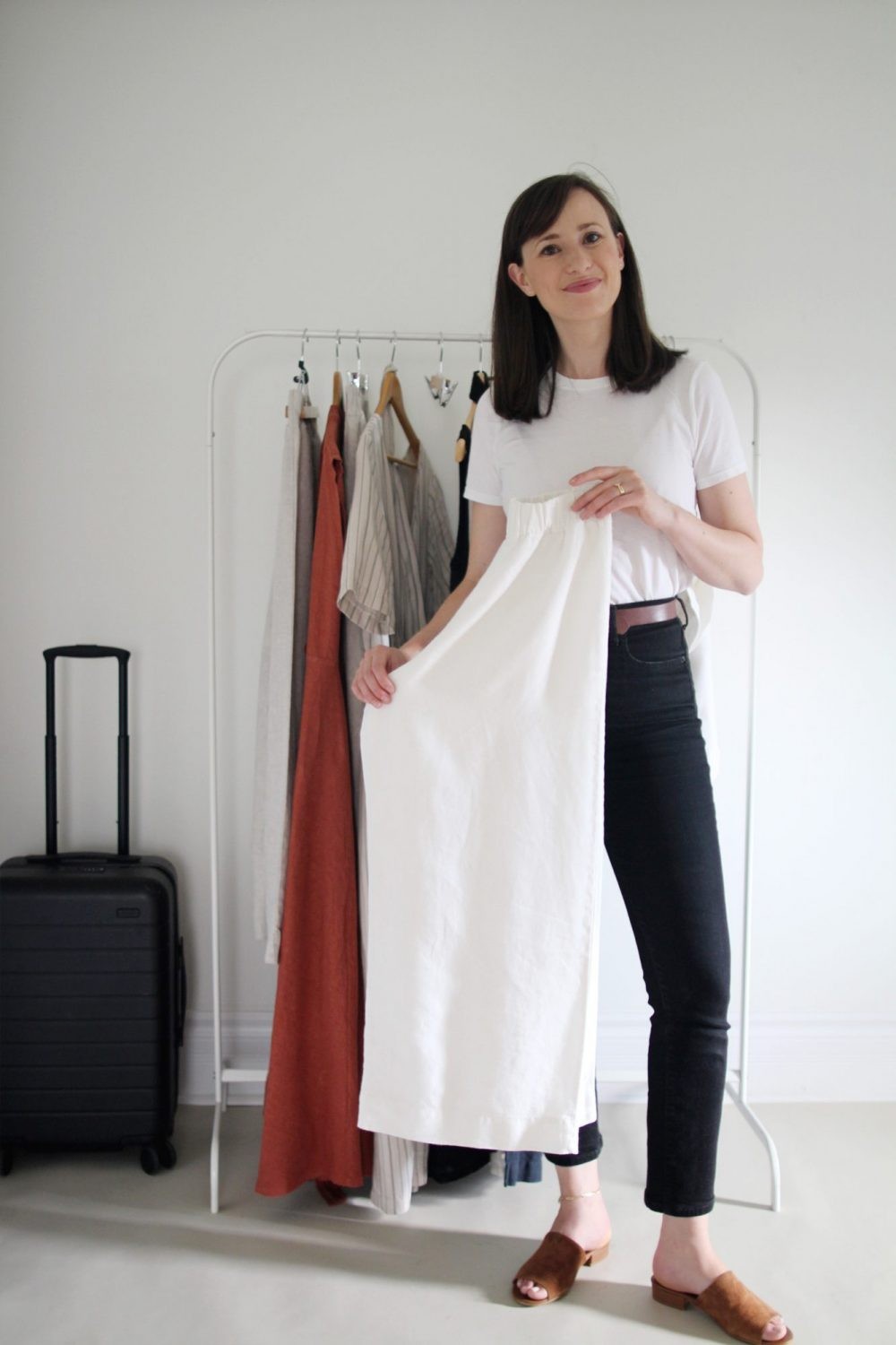 Laying linen pants flat on a surface