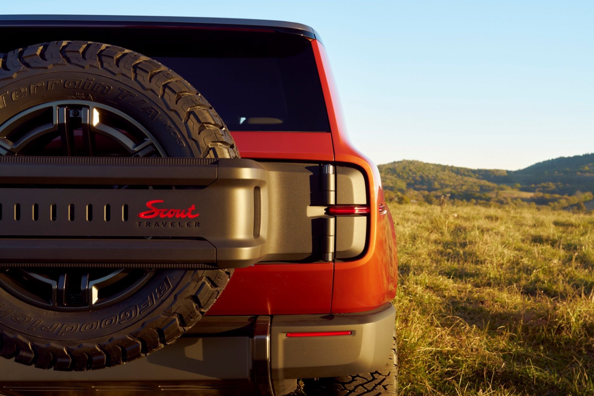 A close-up of the Scout Traveler SUV's wheel and suspension