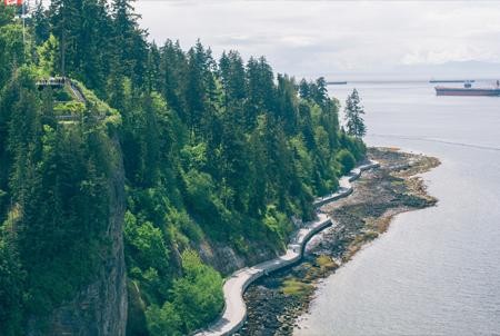 Stanley Park Seawall is an iconic nine kilometre pathway running along the coastal perimeter of Vancouver's Stanley Park. A beautiful paved trail beloved by cyclists, joggers, or just those out for a leisurely stroll by the oceanside