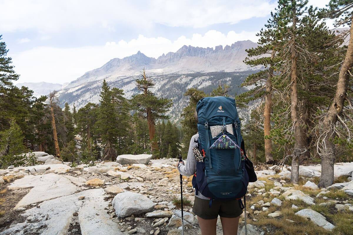 Woman with backpack enjoying the scenery