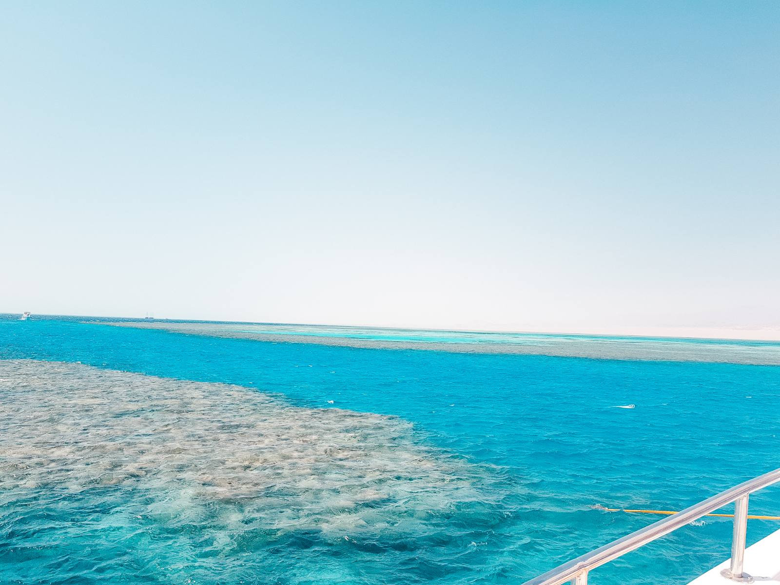 Snorkeling in the Red Sea near Sharm el Sheikh, Egypt, showing clear waters and colorful coral reefs