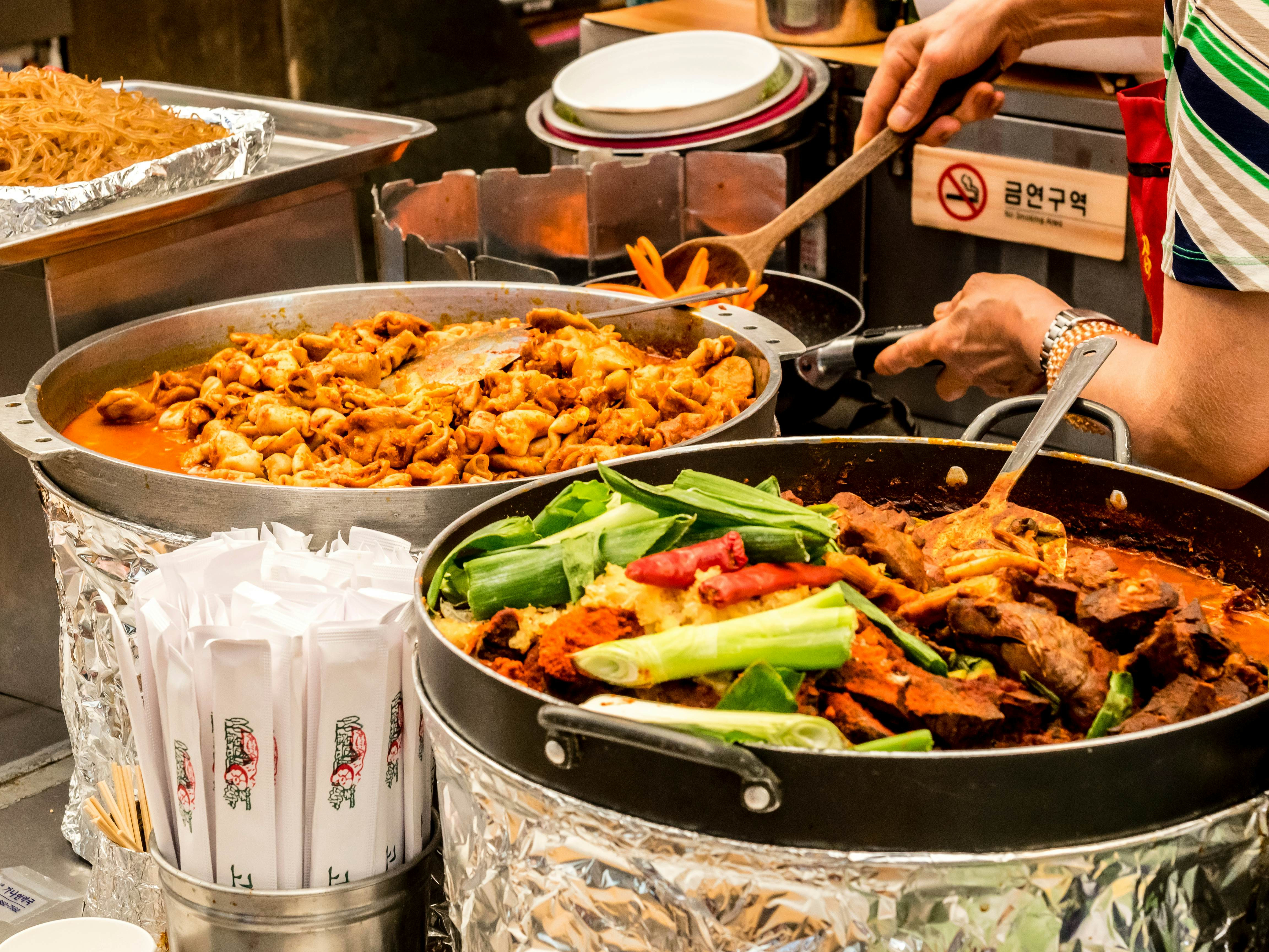 Korean food at Gwangjang Market in Seoul, showcasing the vibrant flavors and communal dining experience