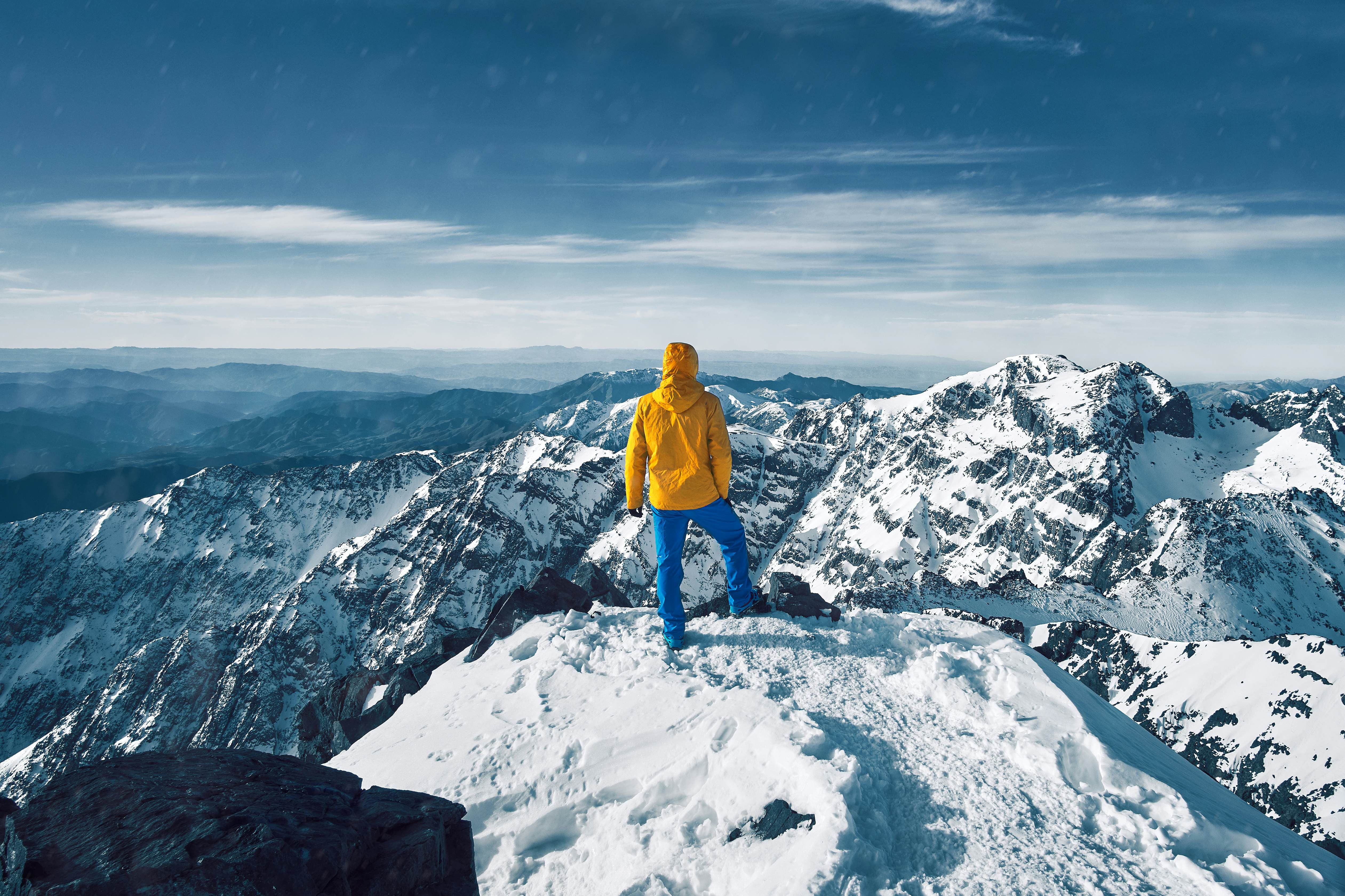 Hiker on snow-covered Jebel Toubkal