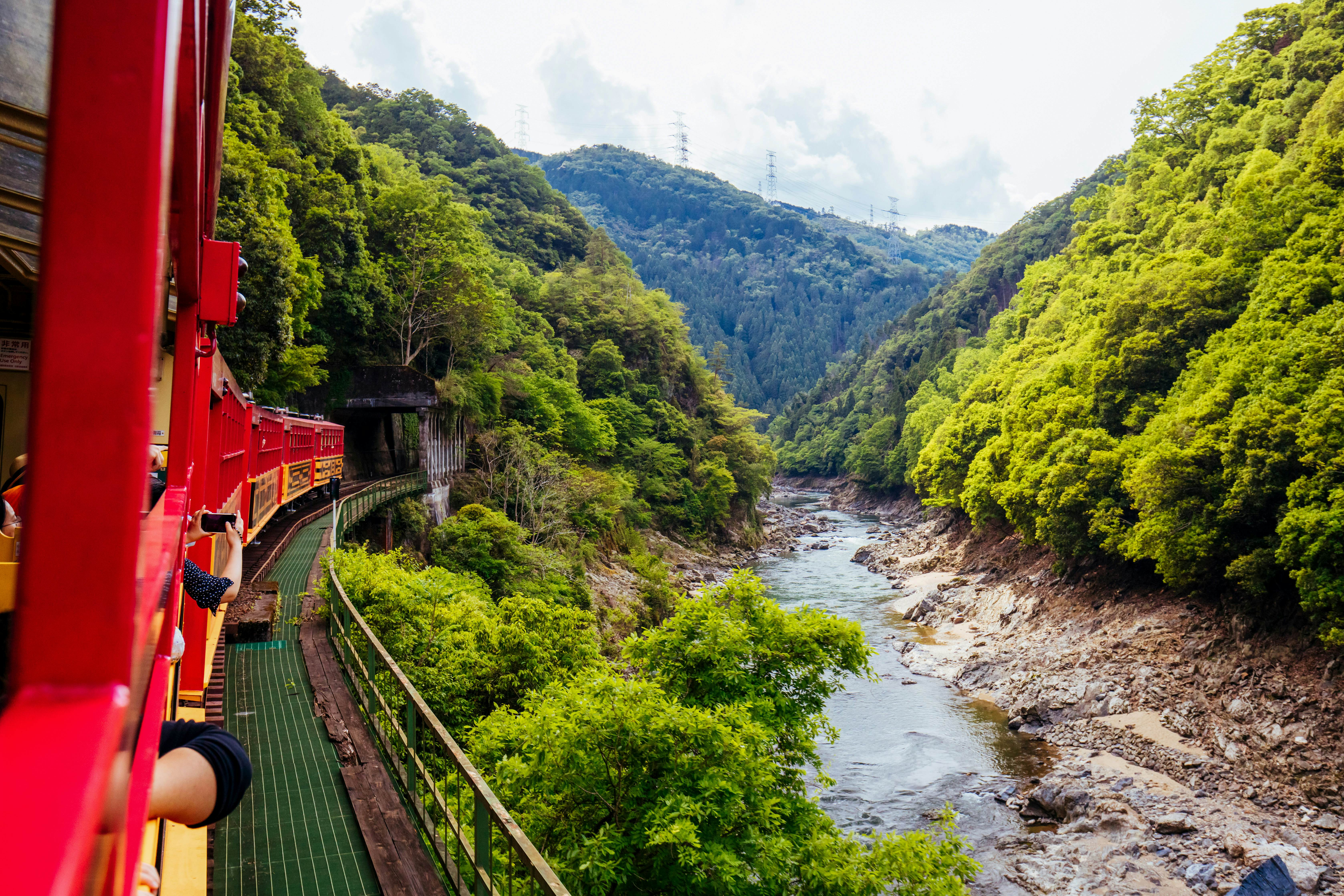 Sagano Romantic Train along the Katsura River near Kyoto, Japan, offering scenic views