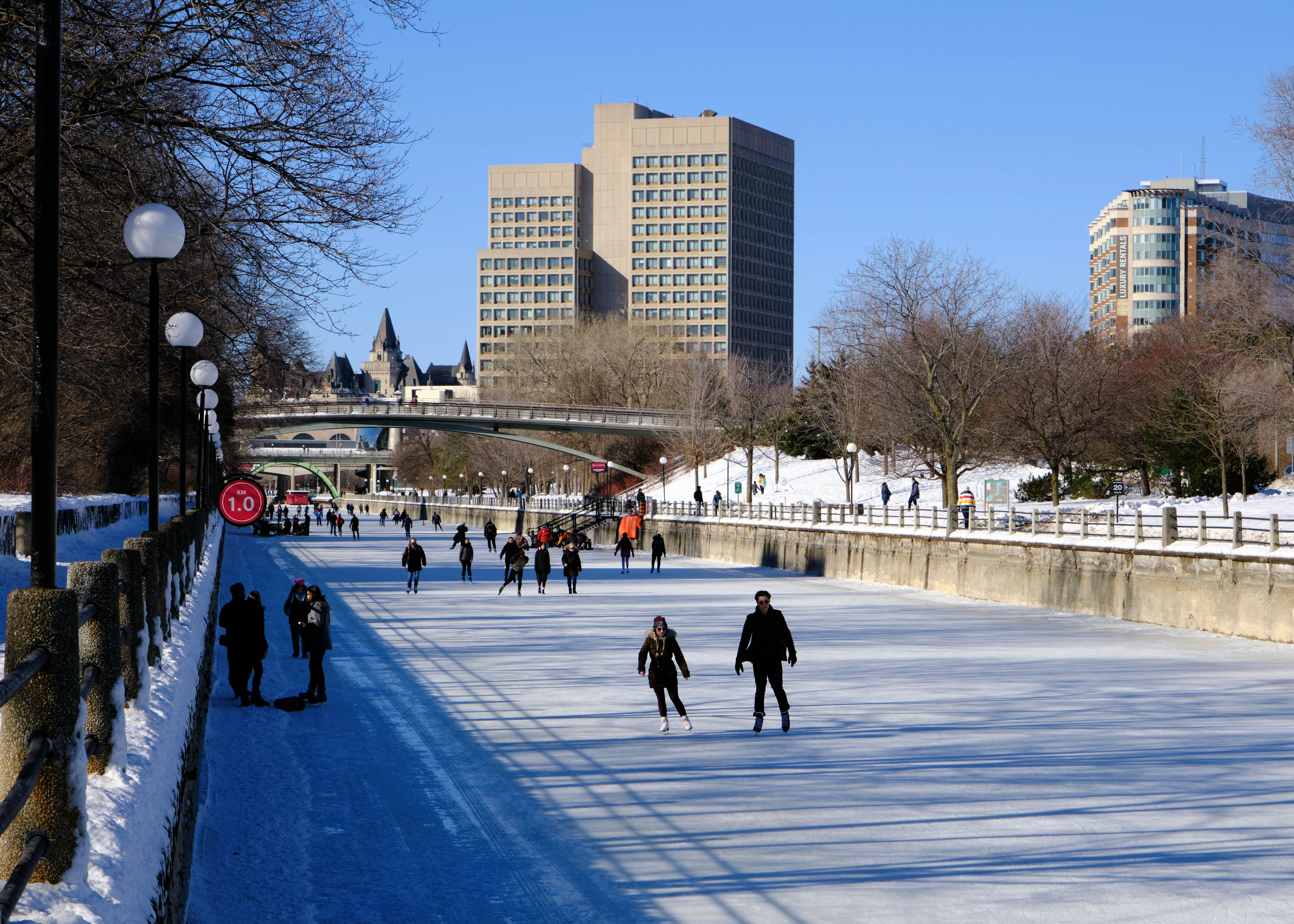 Skaters on Rideau Canal Skateway in Ottawa, Canada