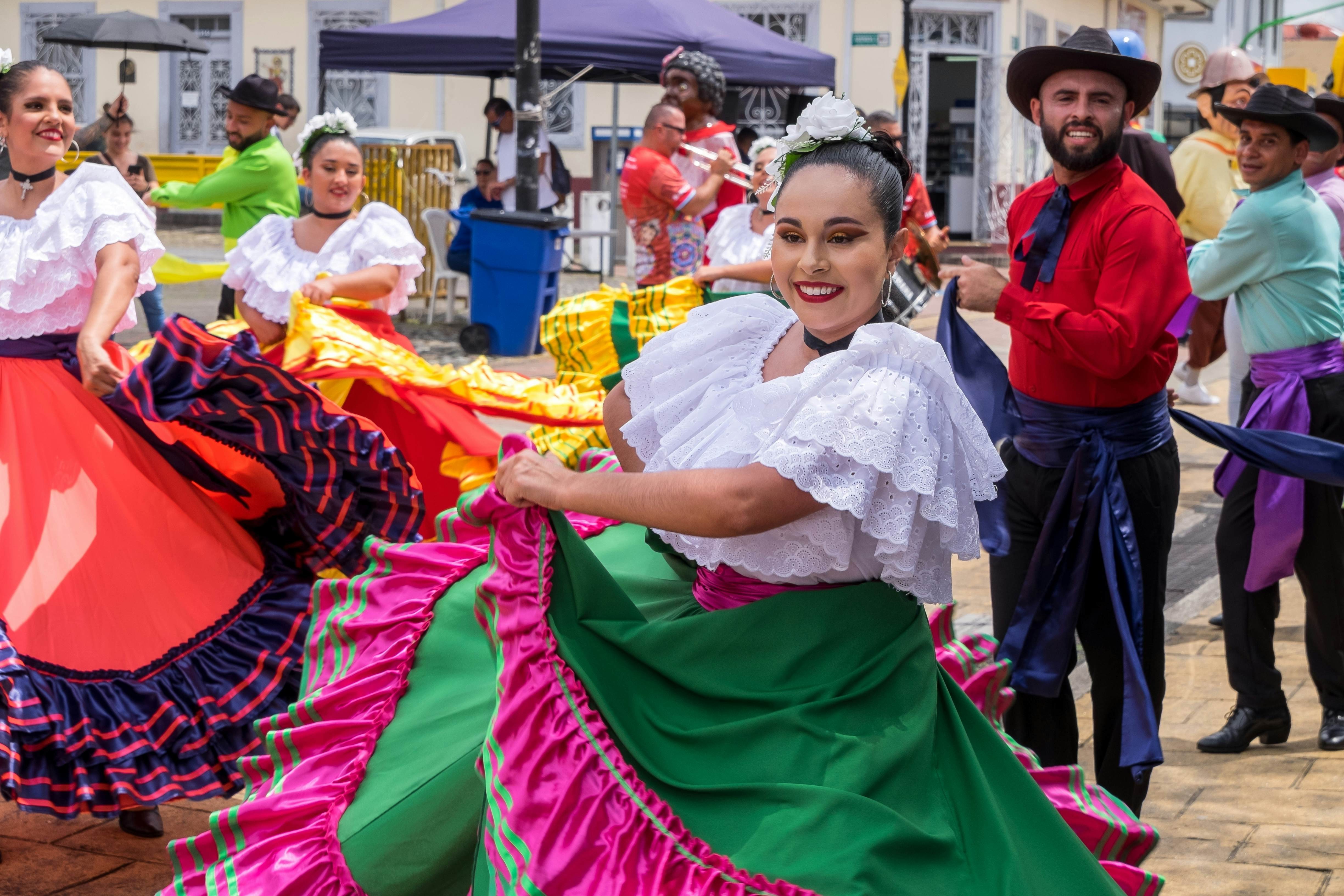 Folk group parading through the urban center of San Jose, Costa Rica.