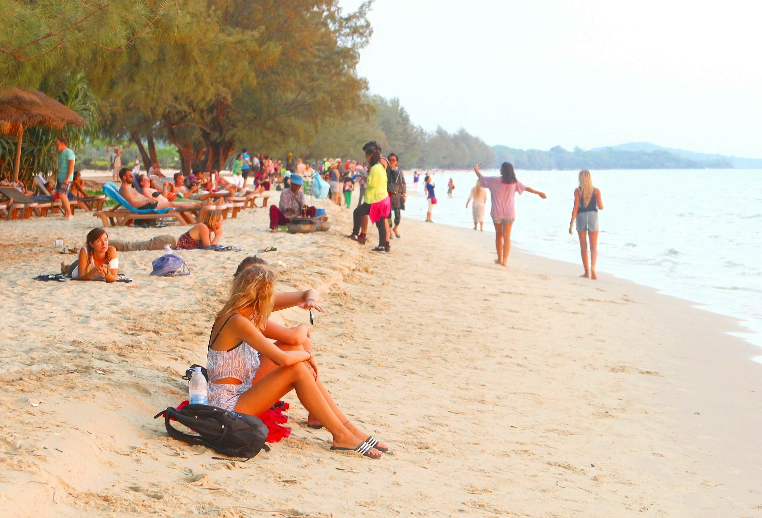Western women relaxing at Otres Beach in Sihanoukville
