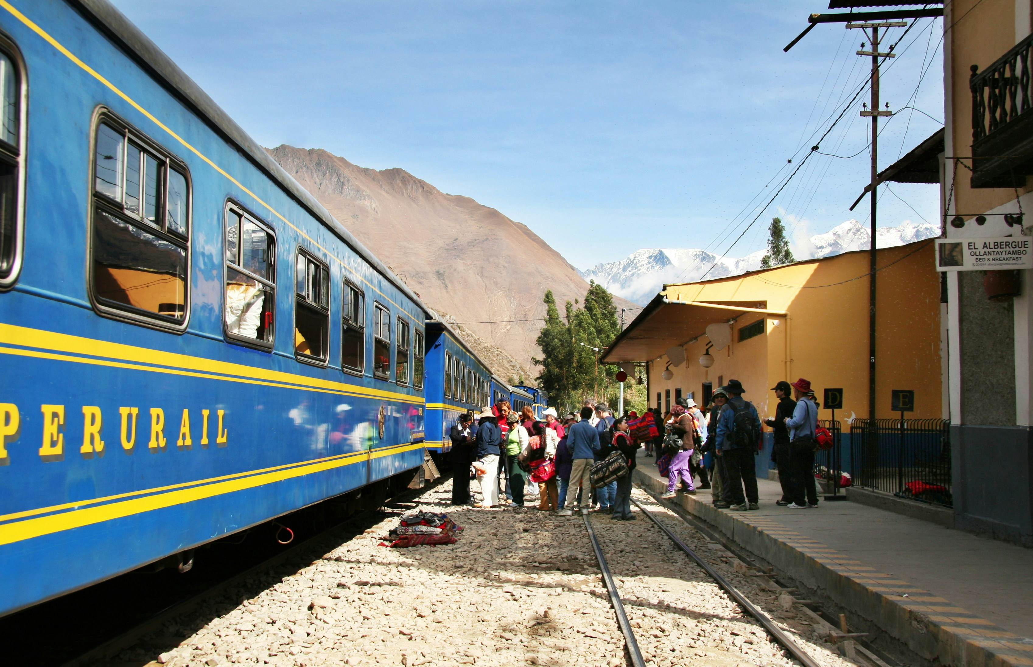 Passengers line up to board a train to Machu Picchu from Ollantaytambo