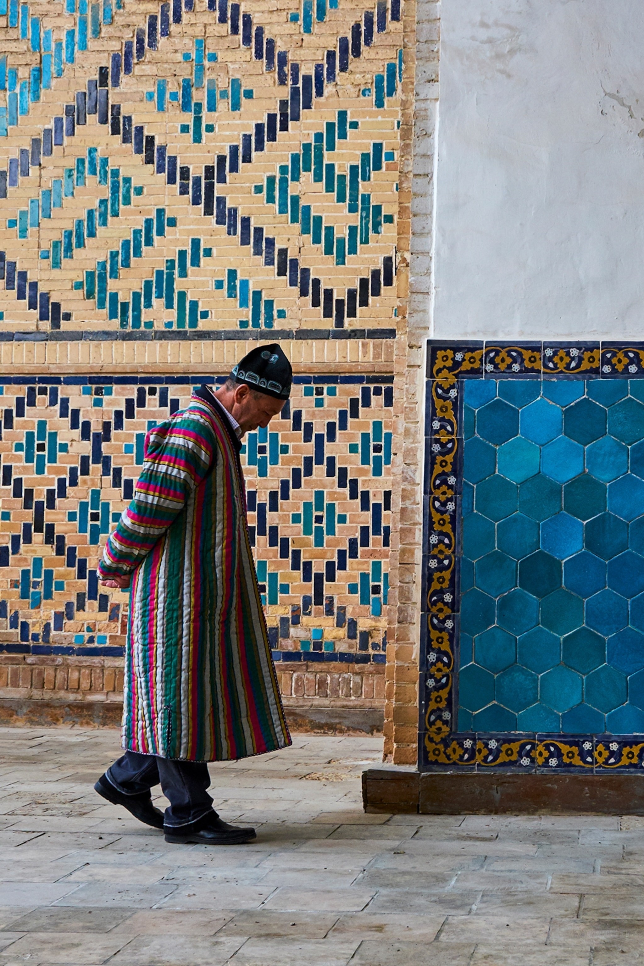 A local on his way to pray at the Kalon Mosque in Bukhara.