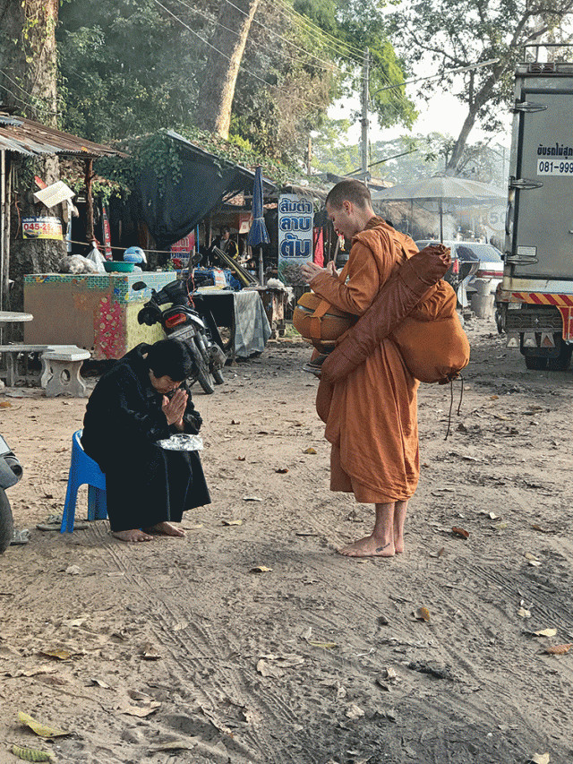 Tan Po gives a blessing.