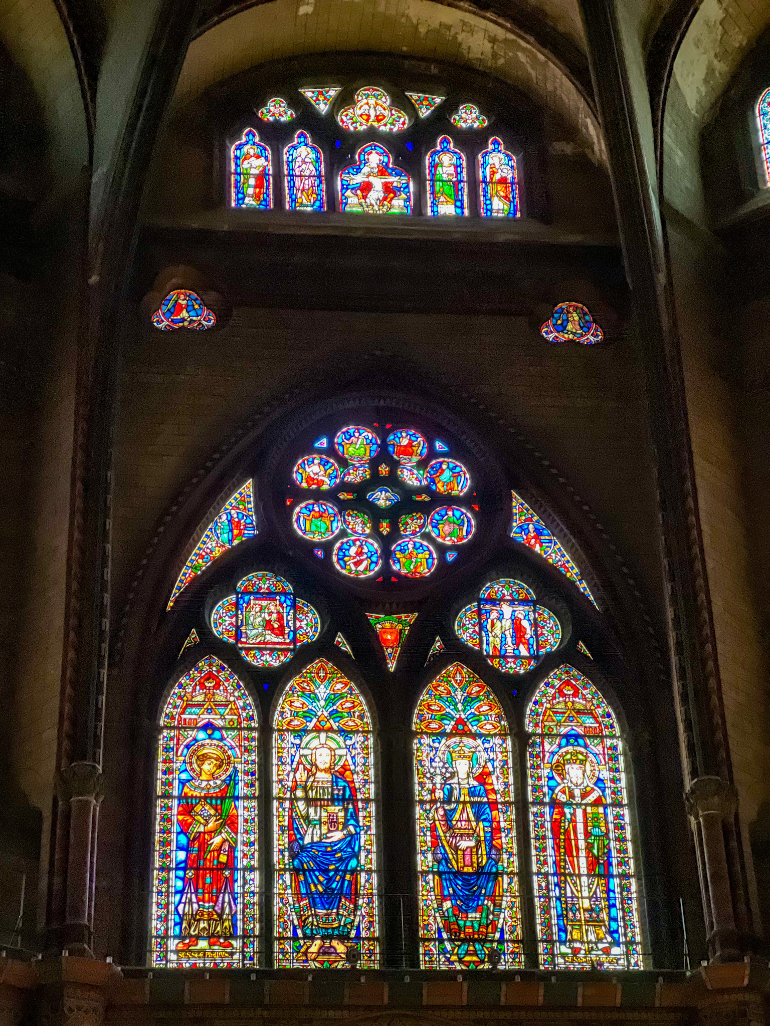 Stained Glass in the Cathédrale Saint-Étienne, showcasing vibrant colors and intricate designs