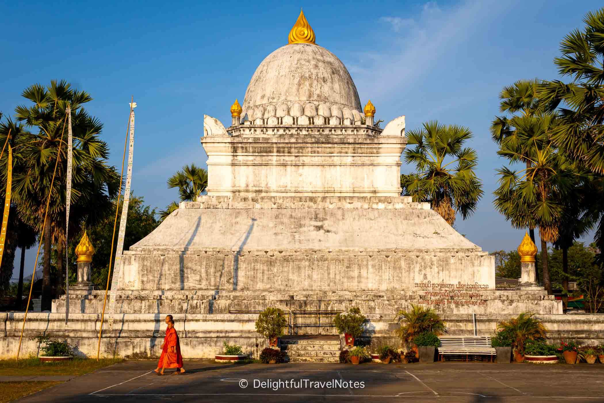 the stupa of Wat Wisunarat glowing at sunset in Luang Prabang