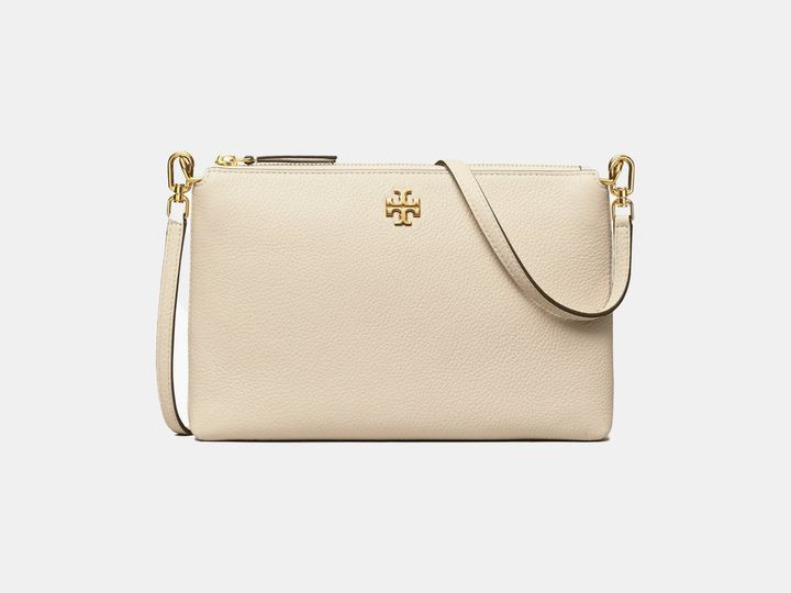 Tory Burch Mercer Pebbled zip crossbody bag in cream.