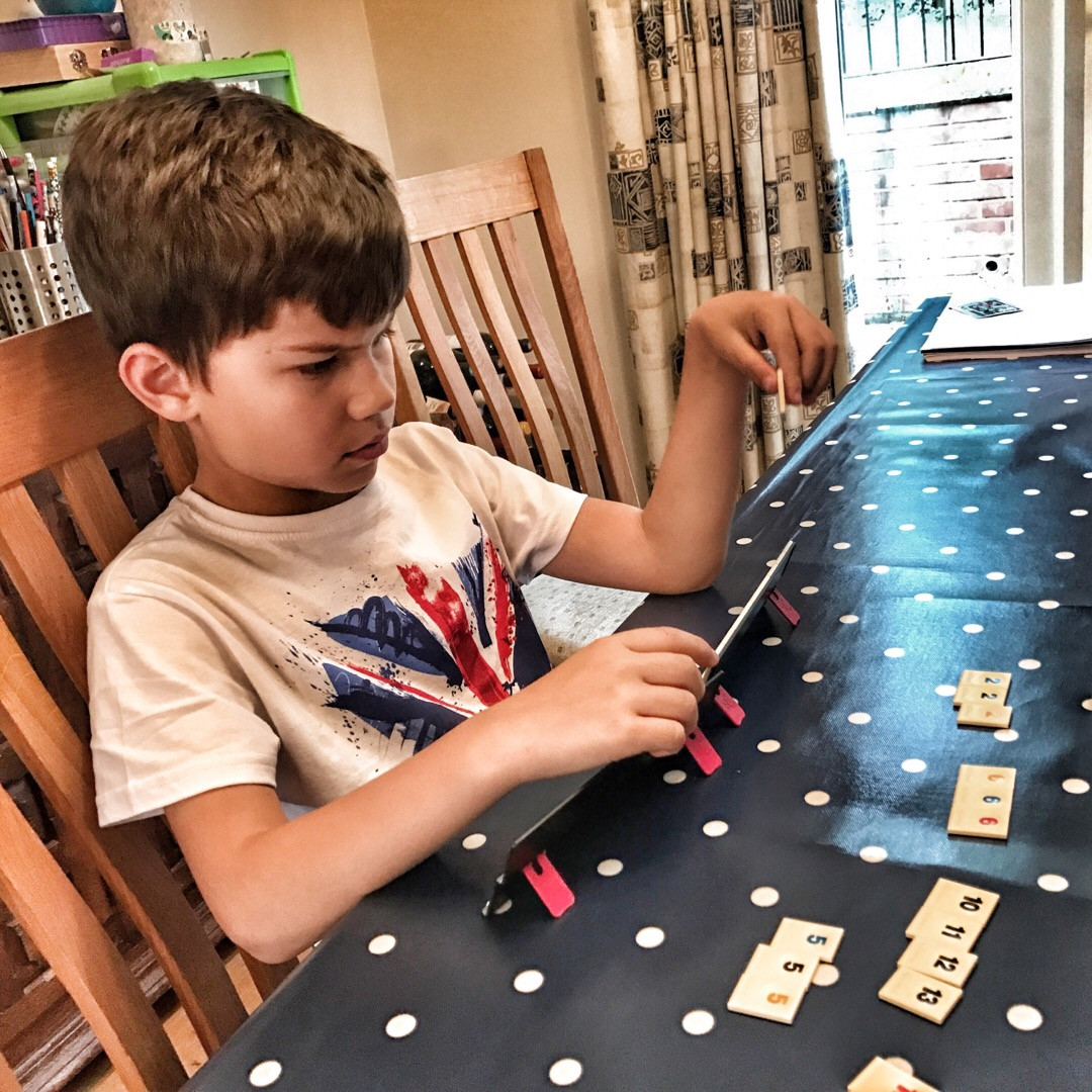 Travel Rummikub game set with racks