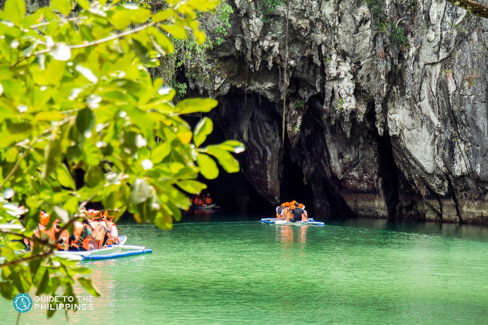 Tourists enjoying the boat ride through Puerto Princesa Underground River