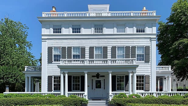 Topping Rose House white exterior in summer