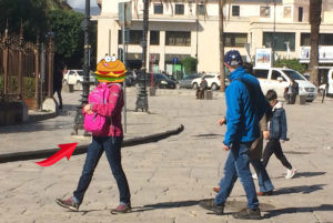 Tourist enjoying a street food tour in Palermo