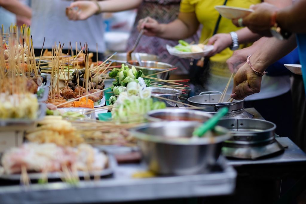 Food being prepared in the streets of Malaysia.
