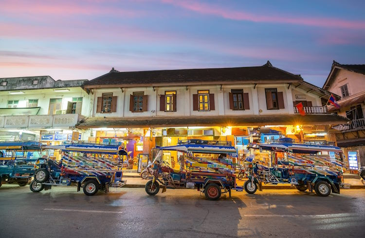 Loatian tuk-tuks in Luang Prabang. Image credit: Getty Images / f11photo