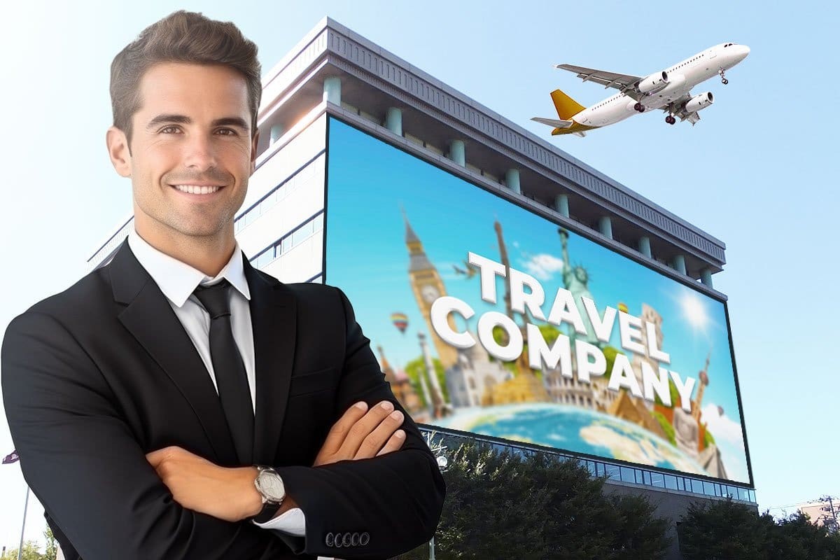 Travel agent standing in front of billboard