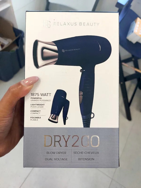 Foldable dual voltage travel hair dryer
