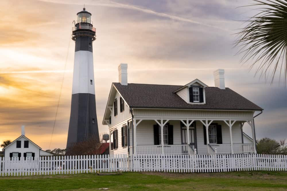 Historic lighthouse on Tybee Island against a blue sky