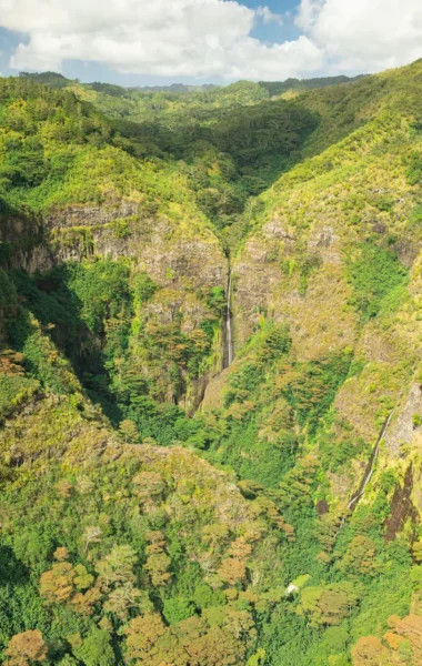 Waterfall cascading through the lush landscapes of Nuku Hiva