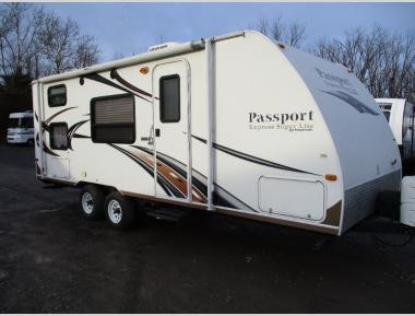Used 2013 Keystone RV Passport 238ML travel trailer.