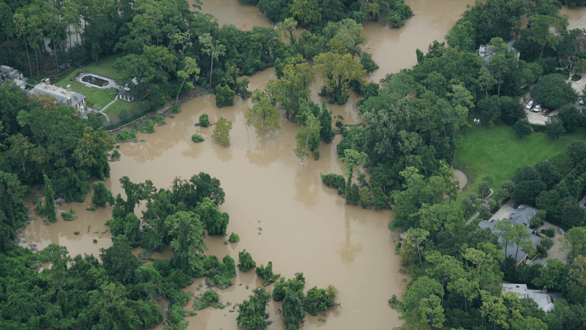 Aerial view of flooded houses and streets after a hurricane